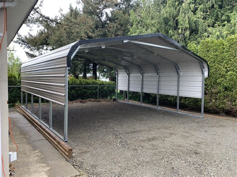 metal covered parking anchored to house|metal carport covers.